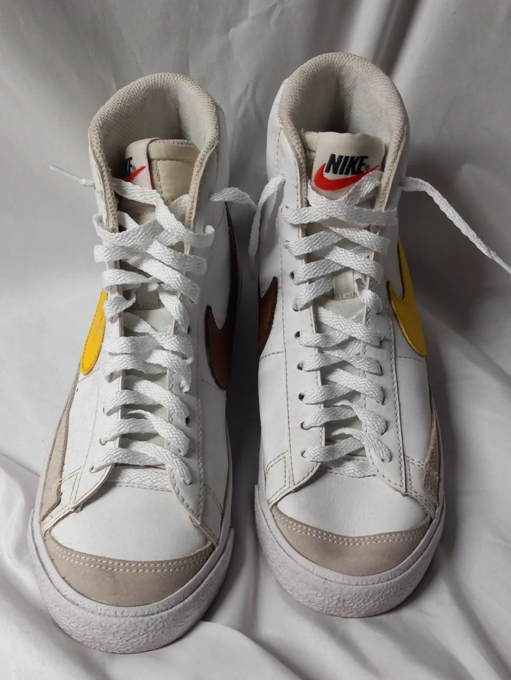 Nike Men’s White High-Top Sneakers with Yellow and Brown Swooshes